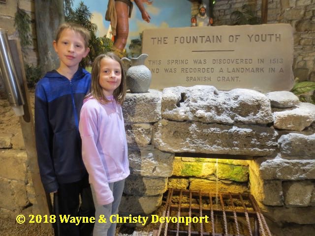 Colby and Denali posing with the Fountain