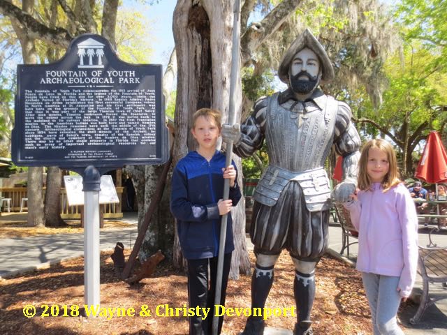 Ponce de León statue at the Fountain of Youth, with Colby and Denali