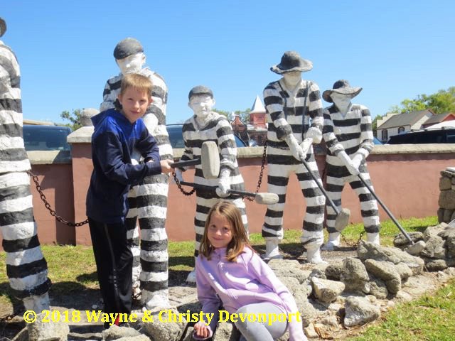 Denali, Colby, and the Chain Gang statue