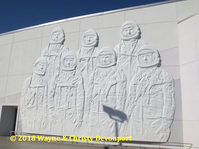 Mercury 7 astronauts bas relief outside of the Heroes & Legends building